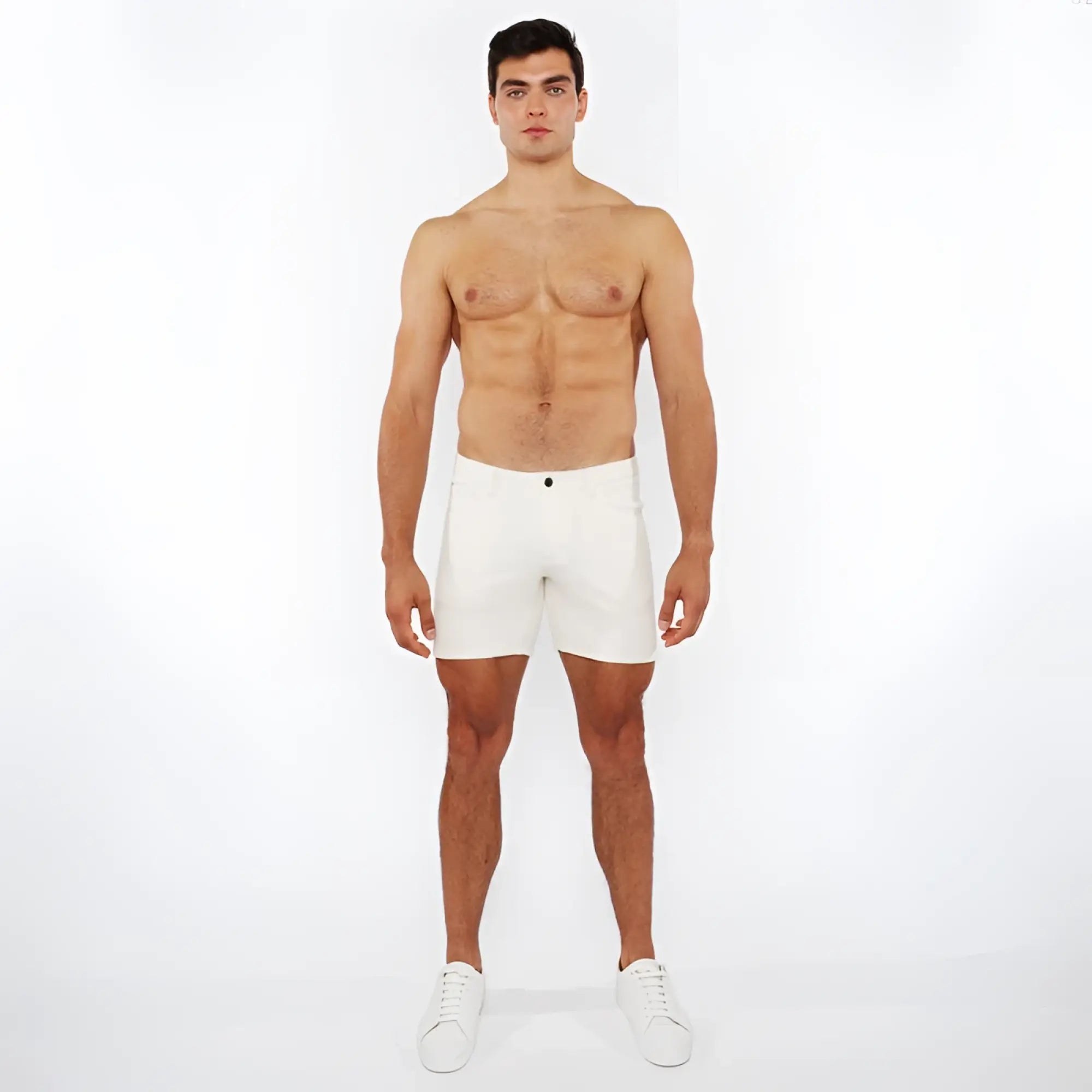 White jaquard stretch knit chino shorts with a sleek minimalist design and a single black button at the waistband