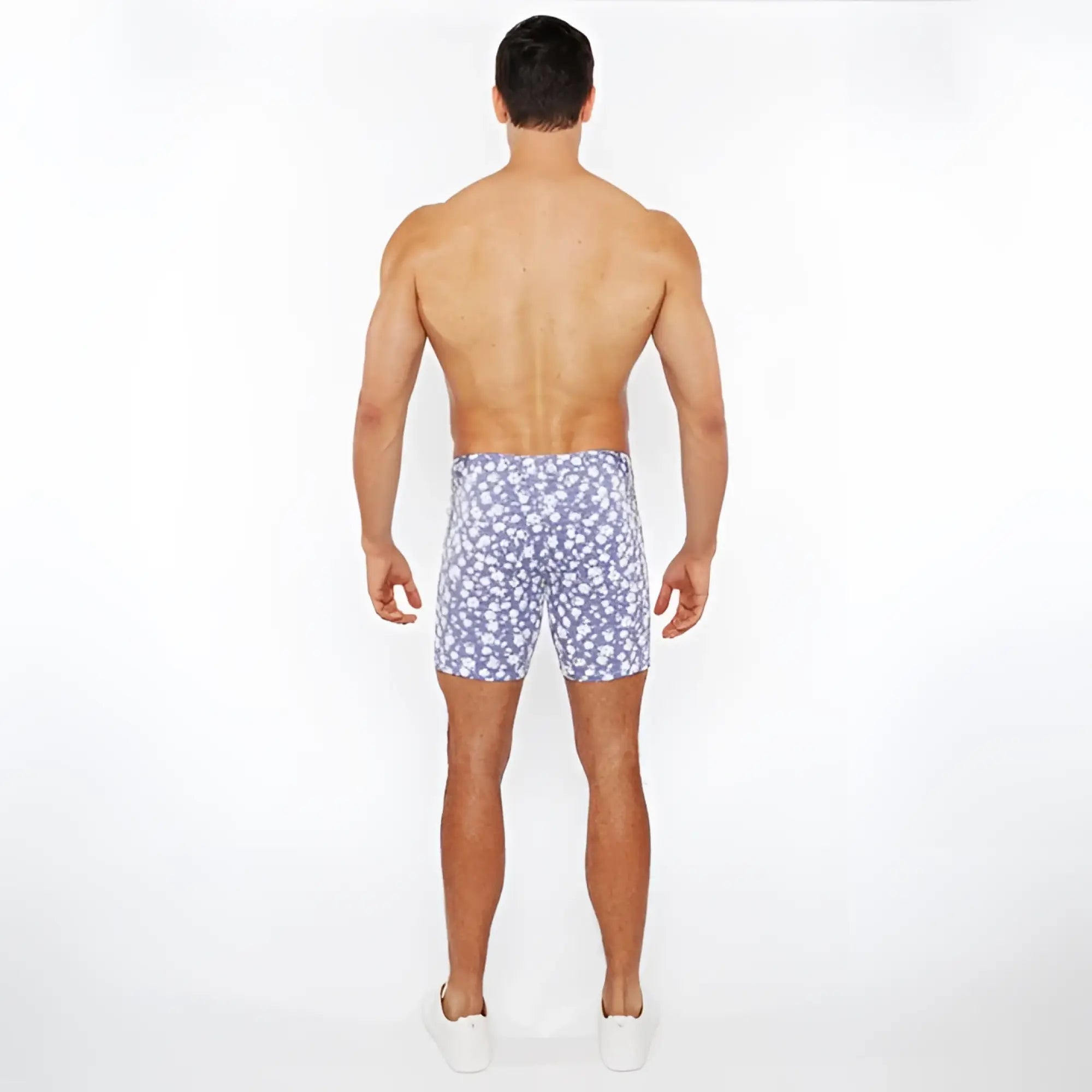 Jaquard stretch knit shorts featuring blue and white floral patterned swim trunks with a stretchy material for comfort