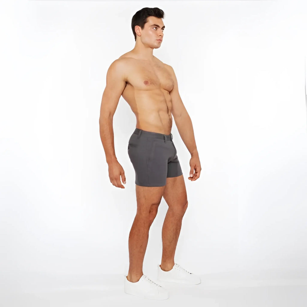 Gray linen-look textured athletic shorts with zip pockets and subtle waistband detail in modern design