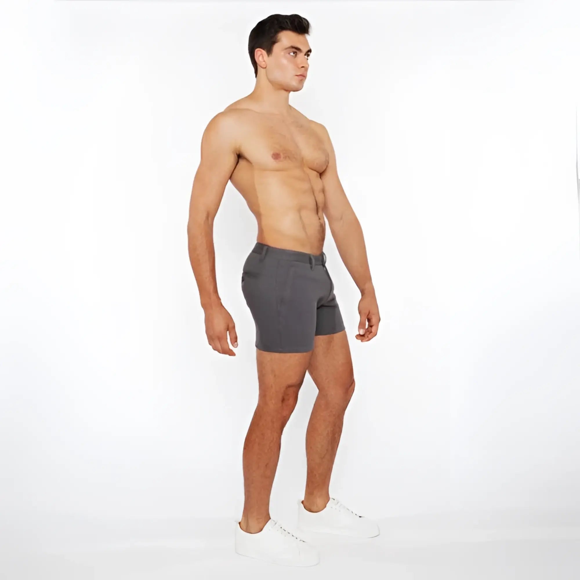 Gray linen-look textured athletic shorts with zip pockets and subtle waistband detail in modern design