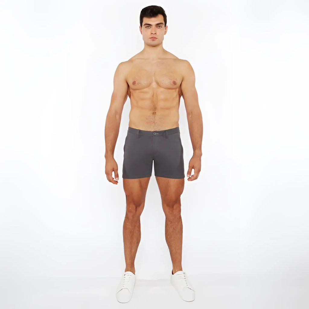 A pair of dark gray linen-look textured slim-fit shorts with zip pockets and a clean modern design