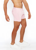 Pink linen-look textured tailored shorts with a modern cut and subtle zip side pockets for stylish comfort