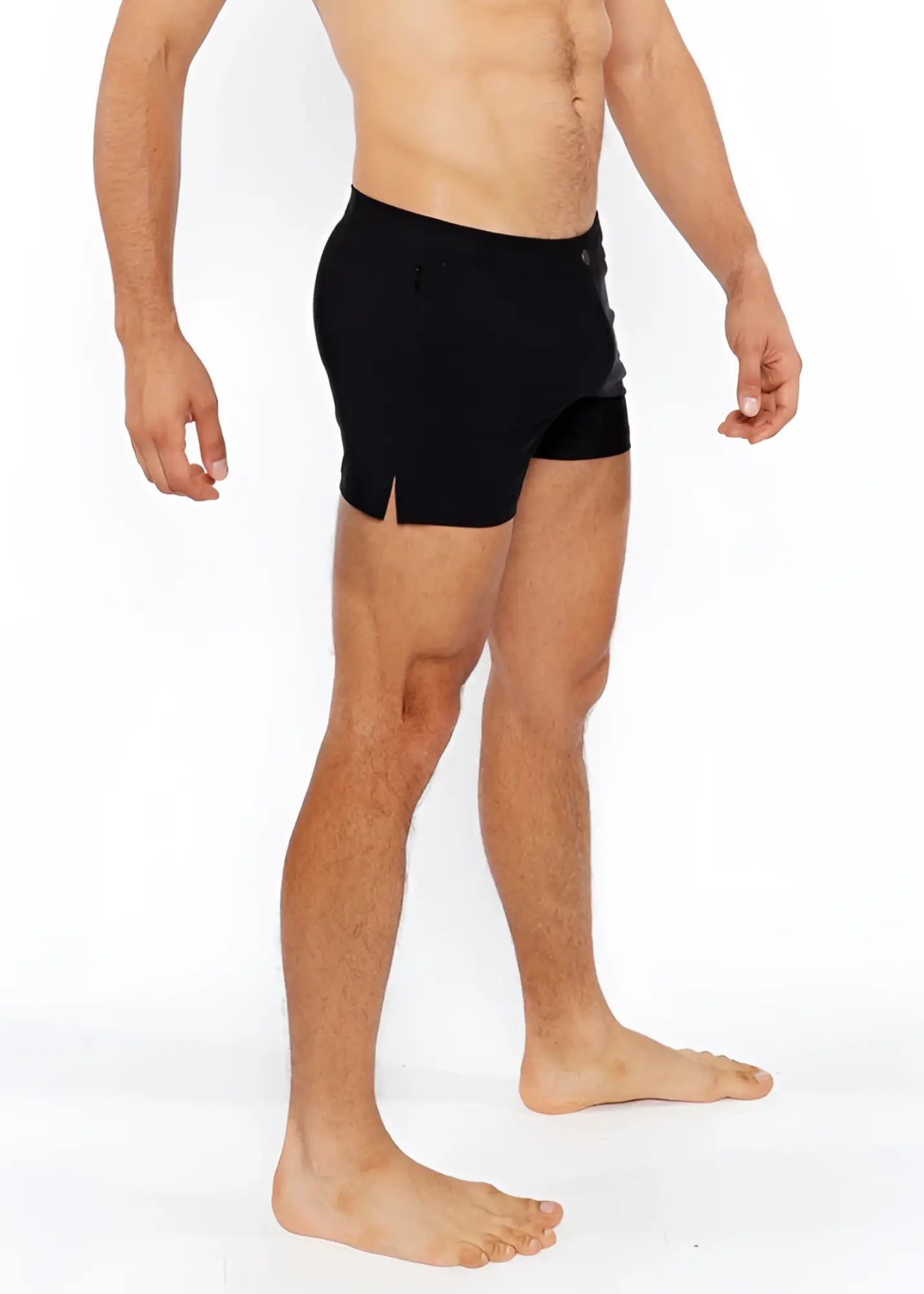 Black pinstripe swim short with sleek form fitting design and subtle side slits ideal for athletic use