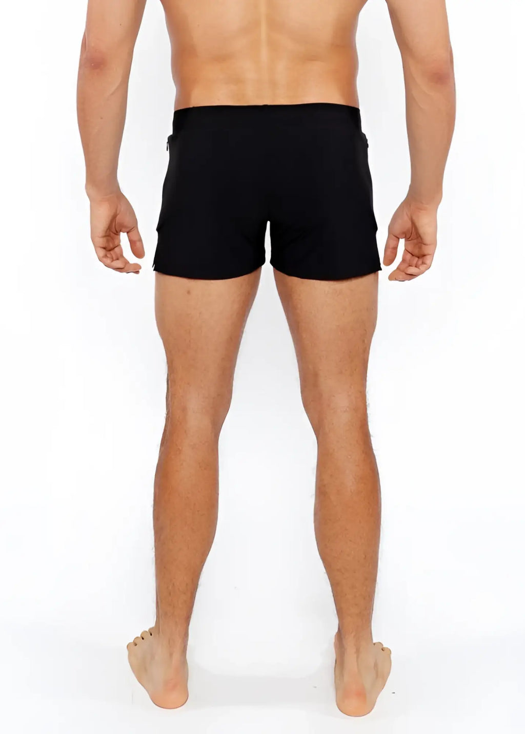 Black pinstripe swim short with sleek form fitting design and subtle side pockets for comfortable wear