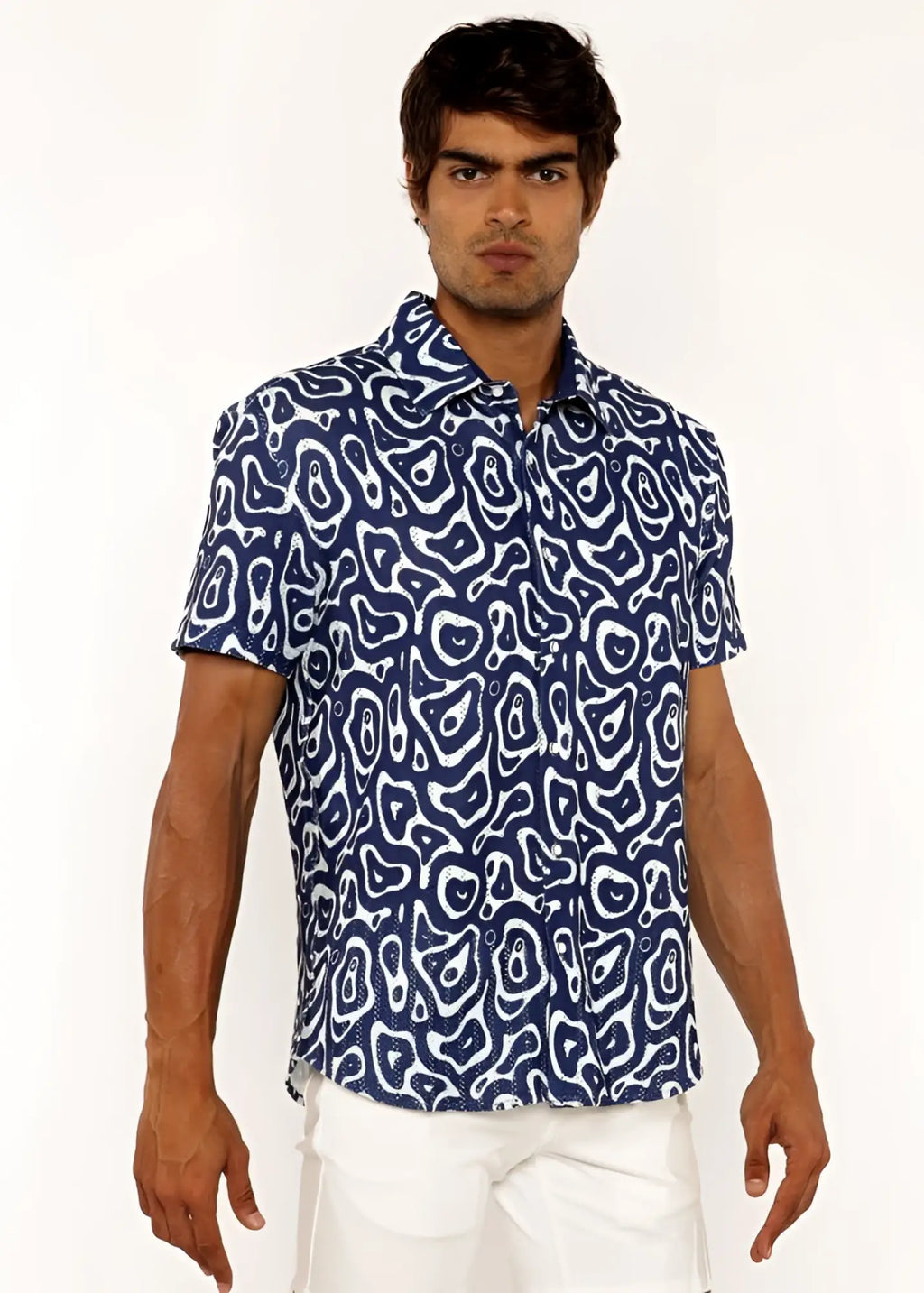 A navy blue short-sleeved squiggly print open knit shirt with white abstract pattern and button-up design