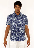 A navy blue short-sleeved squiggly print open knit shirt with a white abstract pattern suitable for casual wear