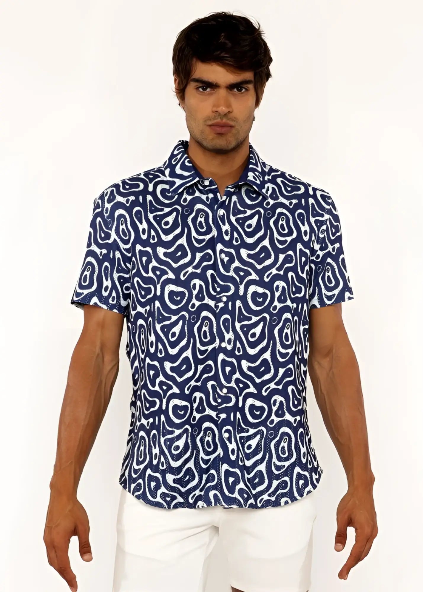 A navy blue short-sleeved squiggly print open knit shirt with a white abstract pattern suitable for casual wear
