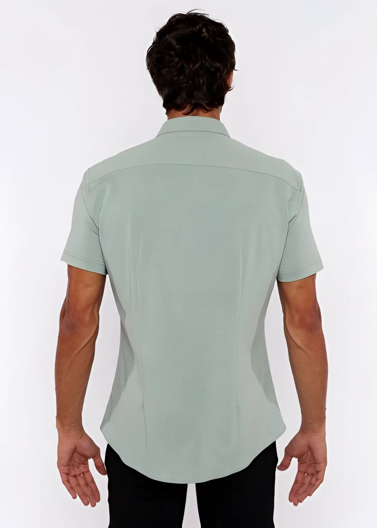 A light green stretch knit shirt for men with short sleeves and tailored fit featuring subtle stitching details