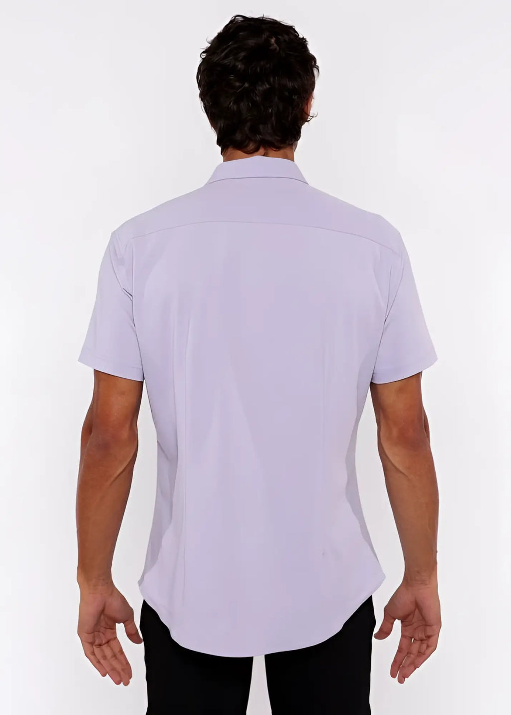 A man wearing a lavender stretch knit shirt with a classic collar and tailored fit in short sleeves