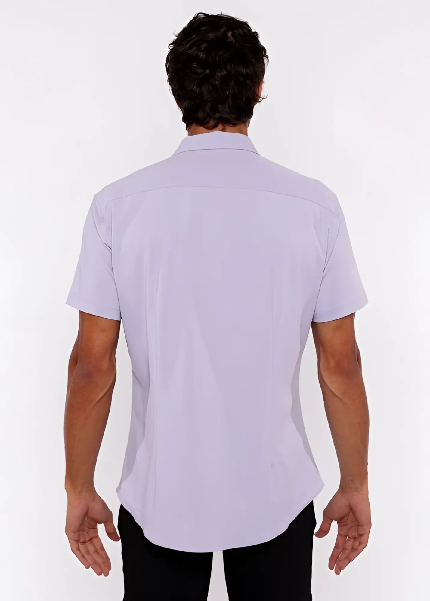 A man wearing a lavender stretch knit shirt with a classic collar and tailored fit in short sleeves