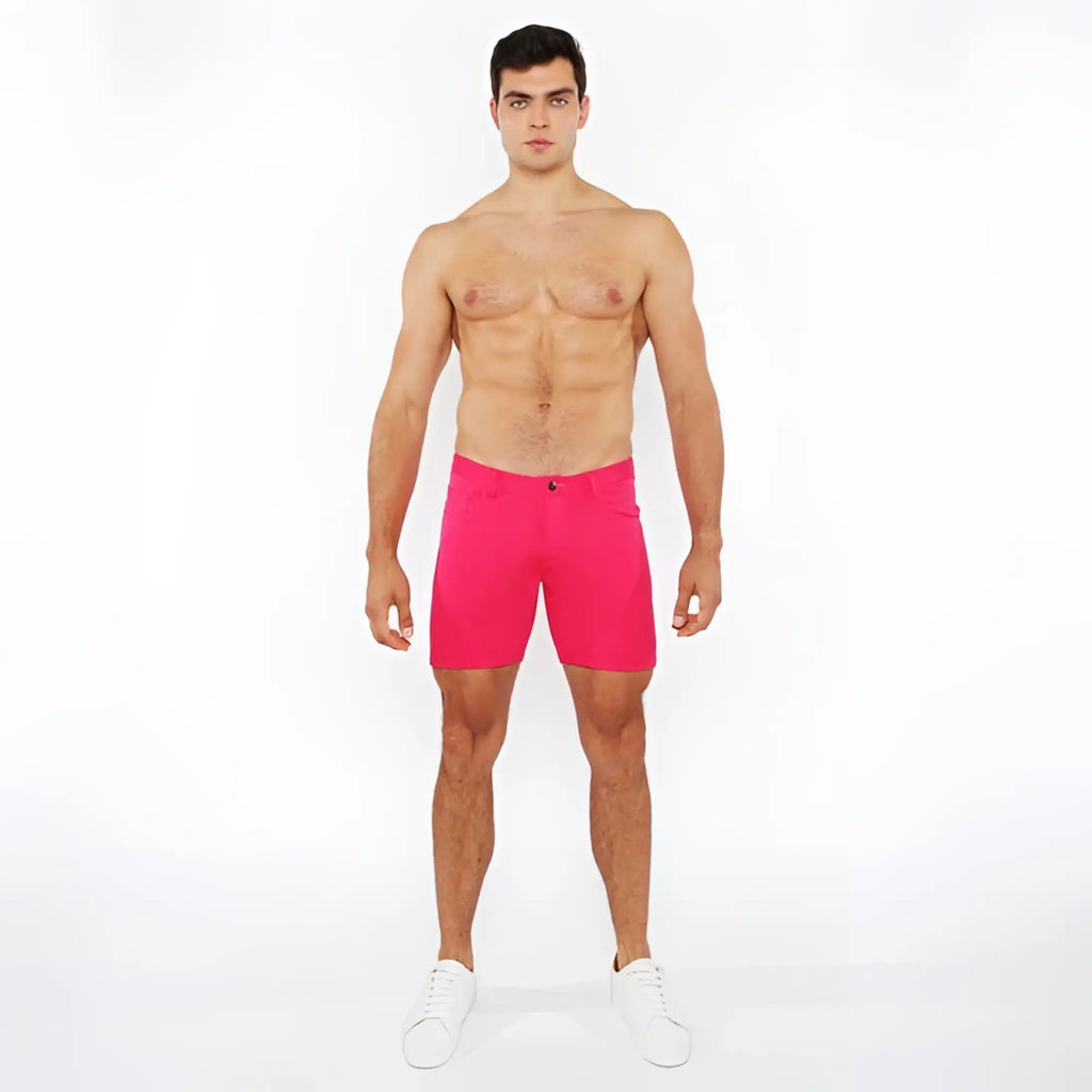 Bright pink stretch knit shorts with classic five-pocket design and button closure for casual wear