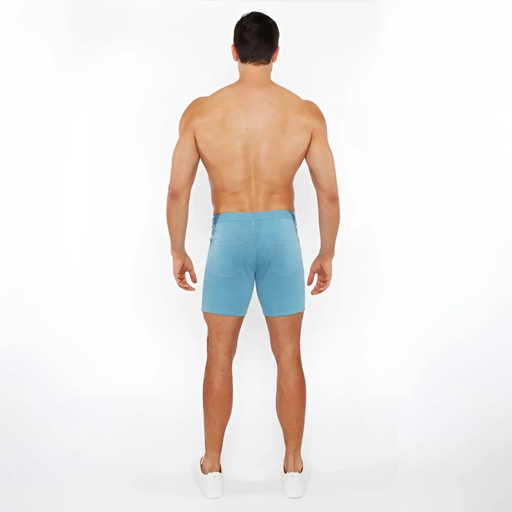 Light blue stretch knit shorts with classic fit and visible stitching in soft denim fabric