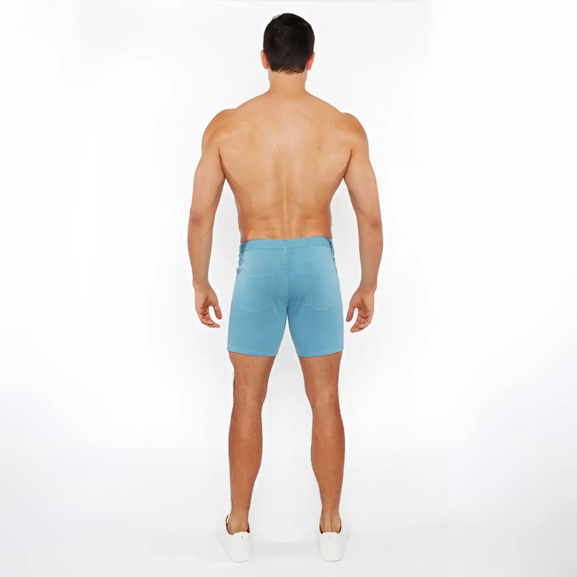 Light blue stretch knit shorts with classic fit and visible stitching in soft denim fabric