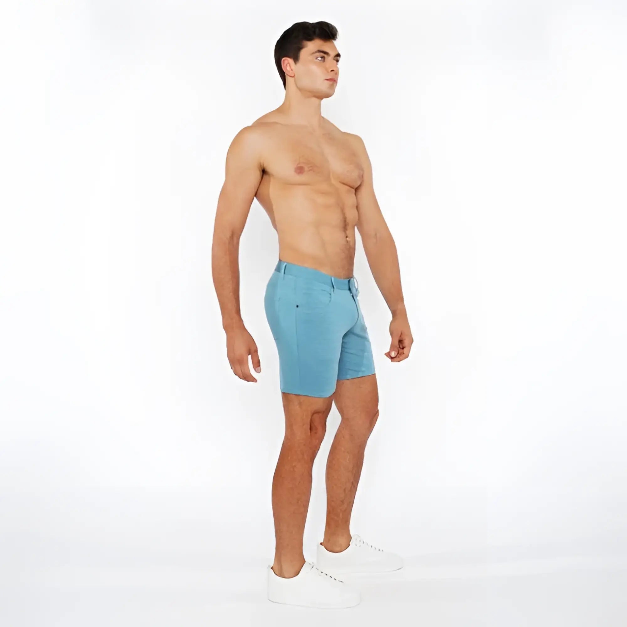 Light blue stretch knit shorts with classic five-pocket design and belt loops made from denim material