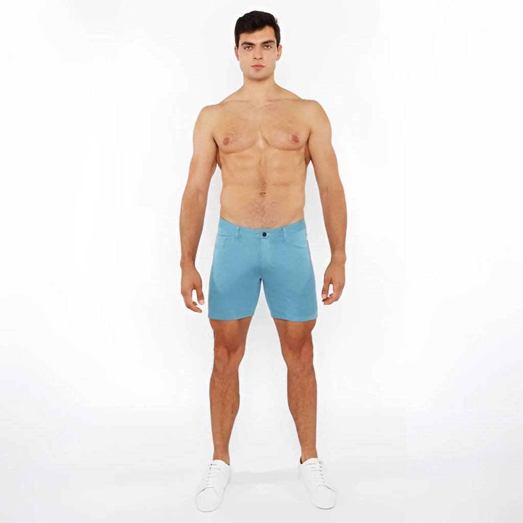 A pair of light blue stretch knit shorts with a form-fitting design and modern style for active wear