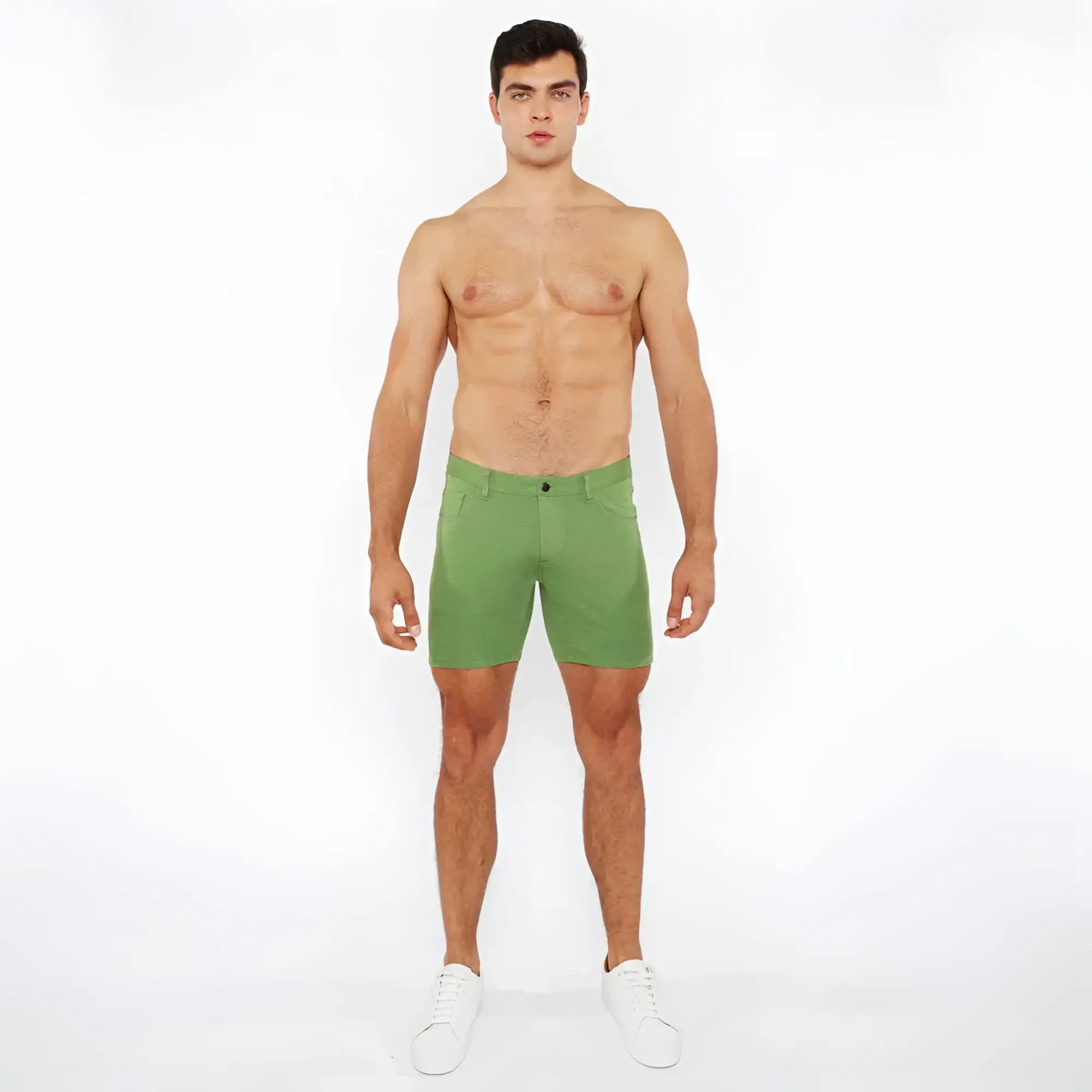 Green stretch knit shorts with a tailored fit and subtle stitching details in a soft stretch fabric