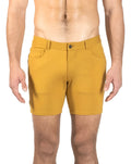 Mustard-yellow ST33LE stretch knit athletic shorts with sleek design and black button closure size 29