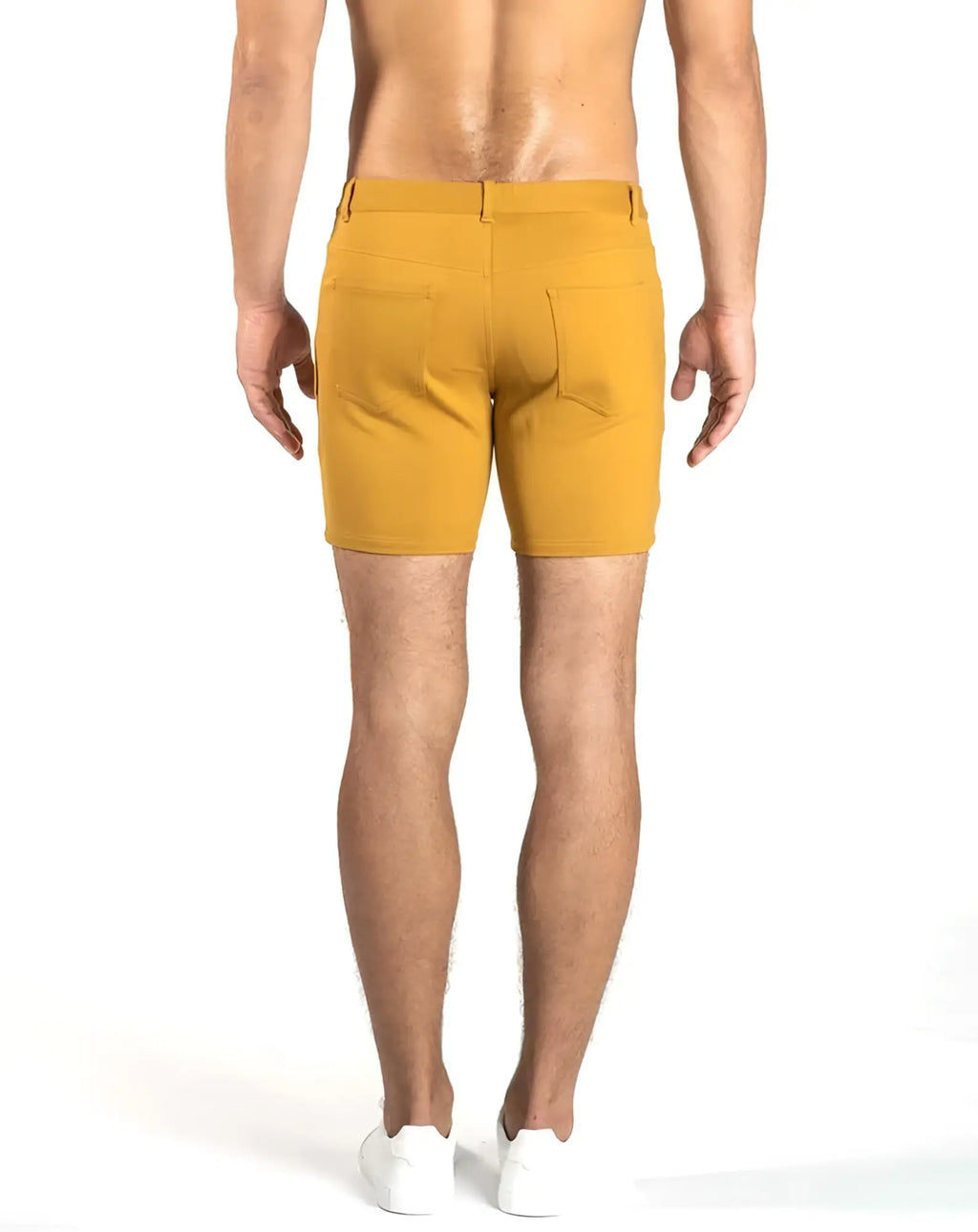Mustard yellow ST33LE stretch knit chino shorts with tailored fit and two back pockets shown from the back size 29