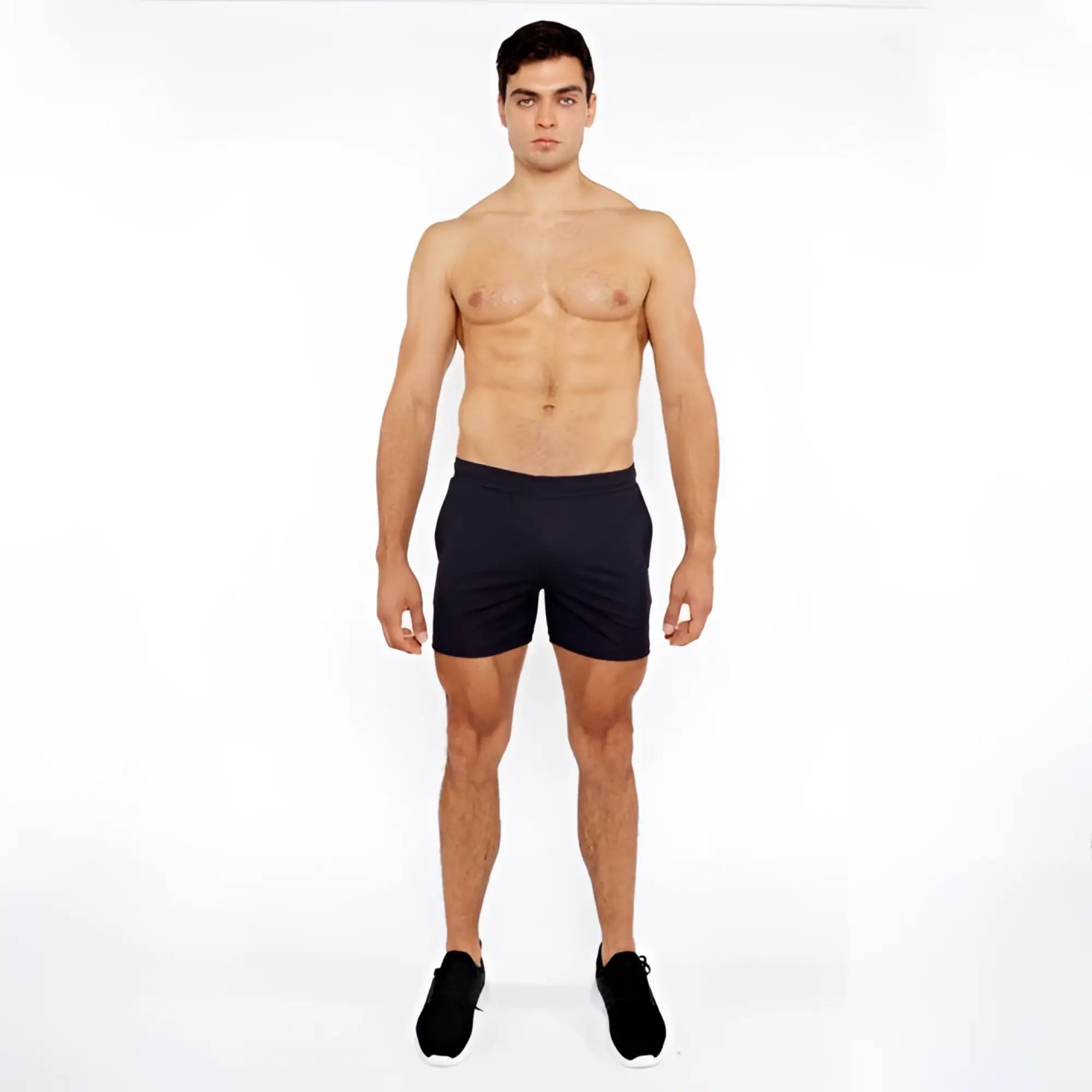 Black textured mesh stretch performance athletic shorts with a sleek minimalist design for activewear use