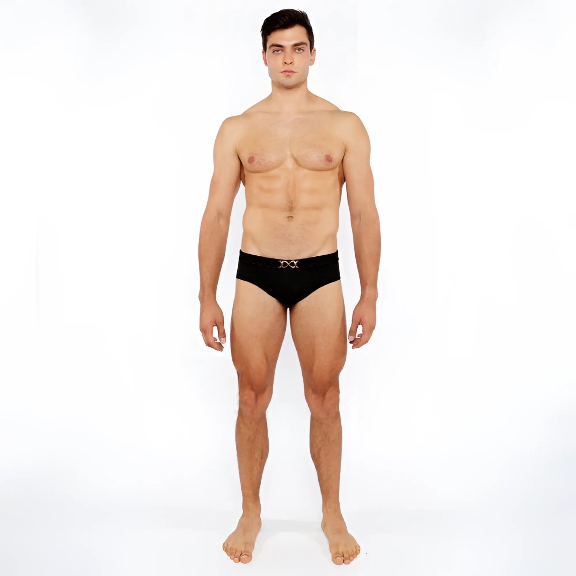 Black textured swim brief with front buckle and silver metallic x-shaped logo on the waistband