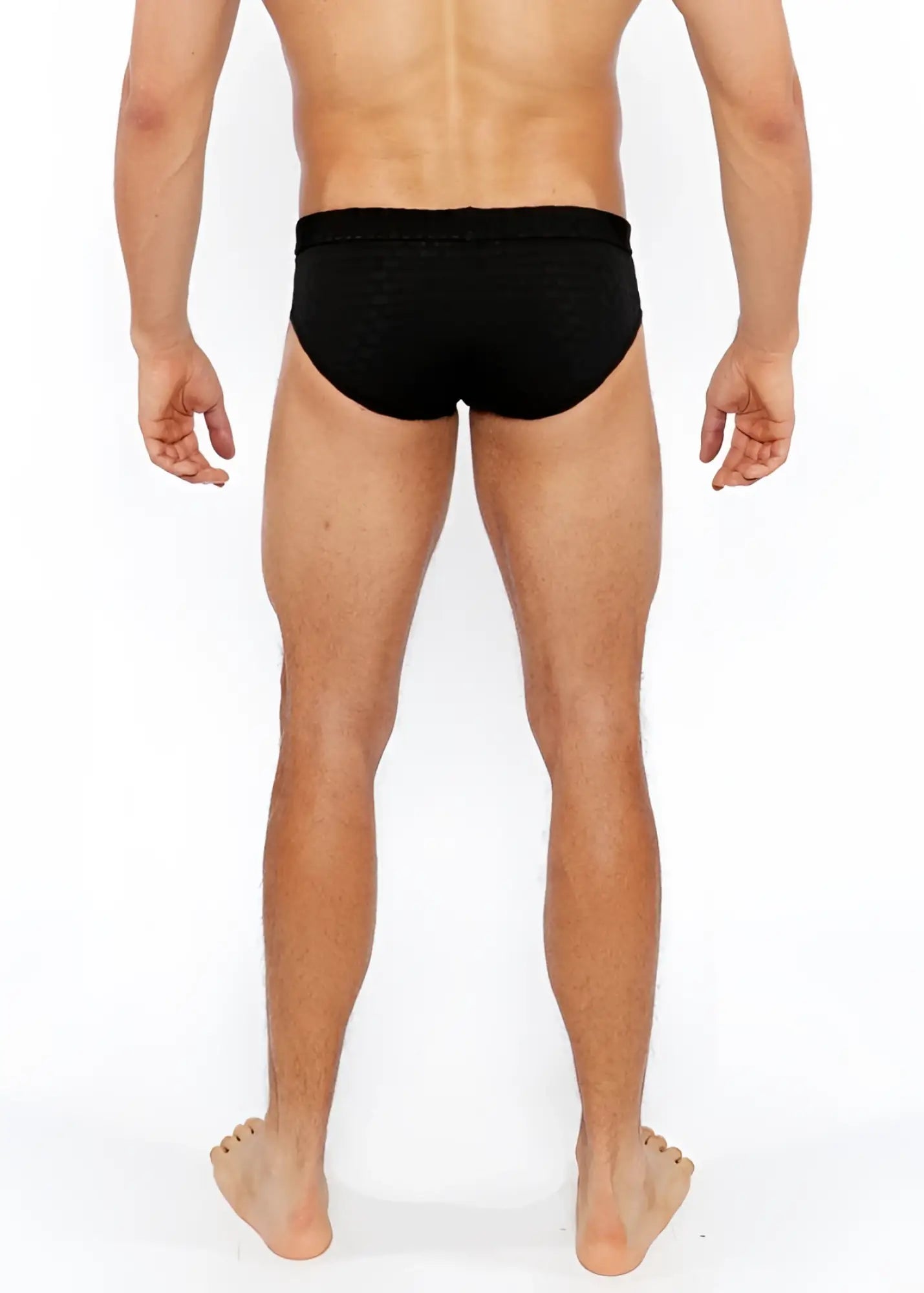 Black textured swim brief with front buckle made of textured fabric for swimming and beachwear use