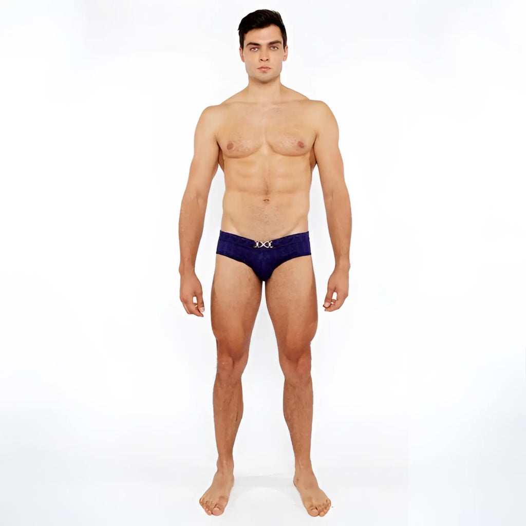 Navy blue textured swim brief with front buckle and metallic silver logo on the waistband for men