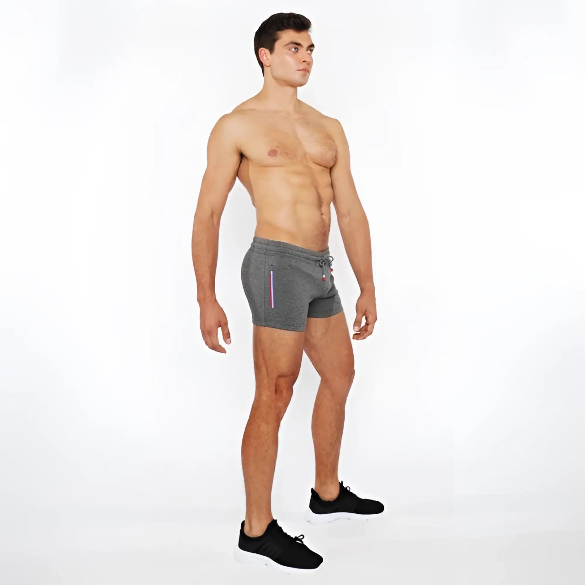 Gray vault gym-tech athletic shorts with drawstring waist and subtle vertical stripe detailing on the side