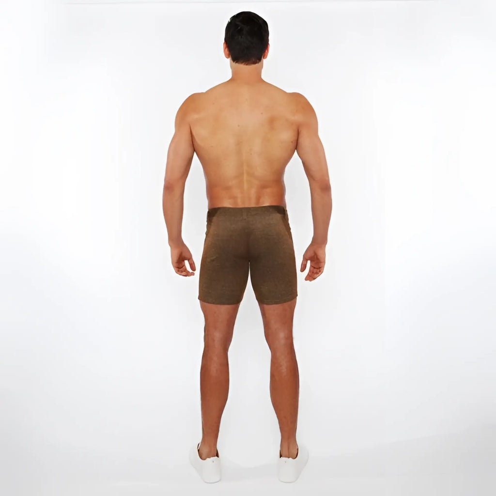 Brown washed denim stretch knit shorts with a subtle textured pattern and form-fitting design