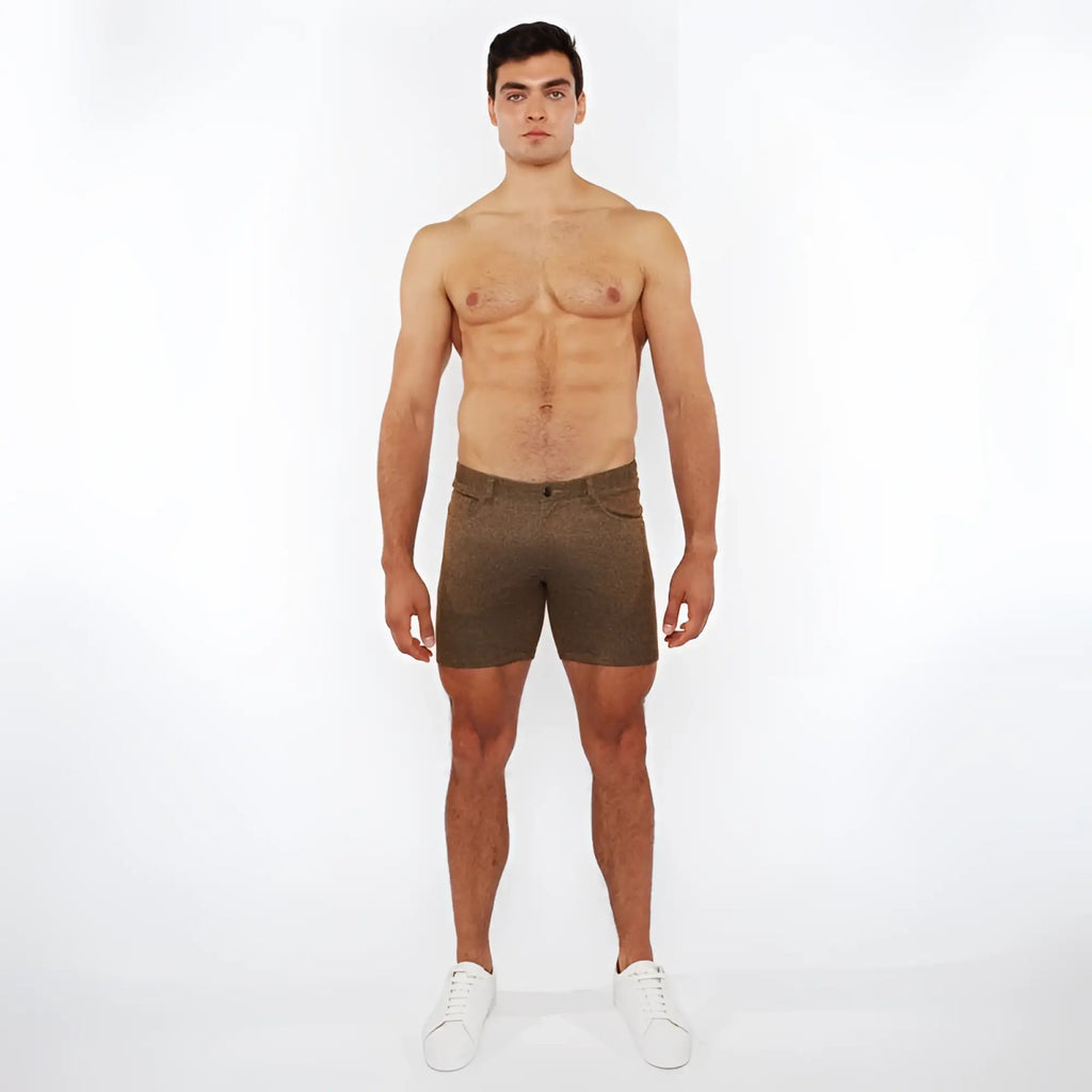 Olive green washed denim stretch knit shorts showing textured fabric and casual style