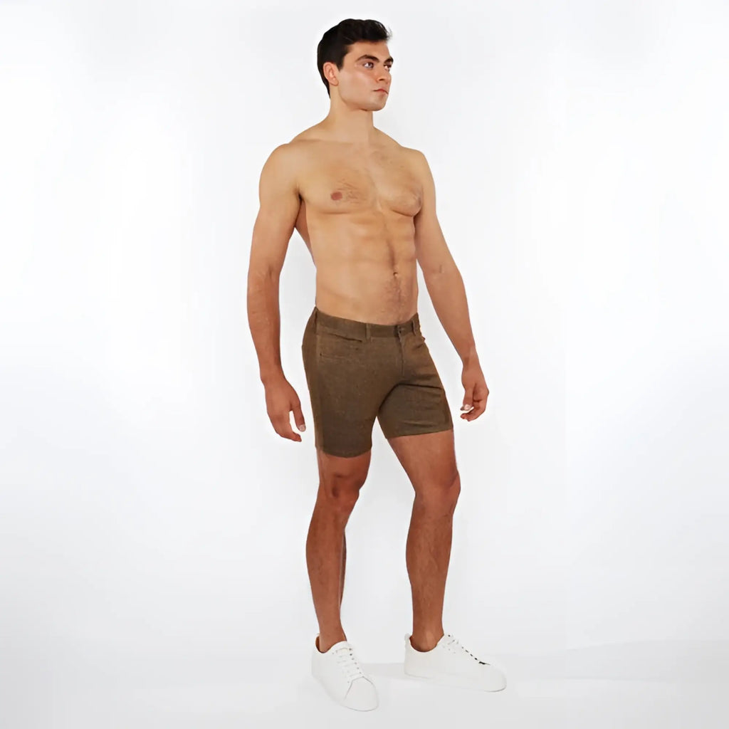 Olive green washed denim stretch knit shorts with textured fabric ideal for casual summer wear