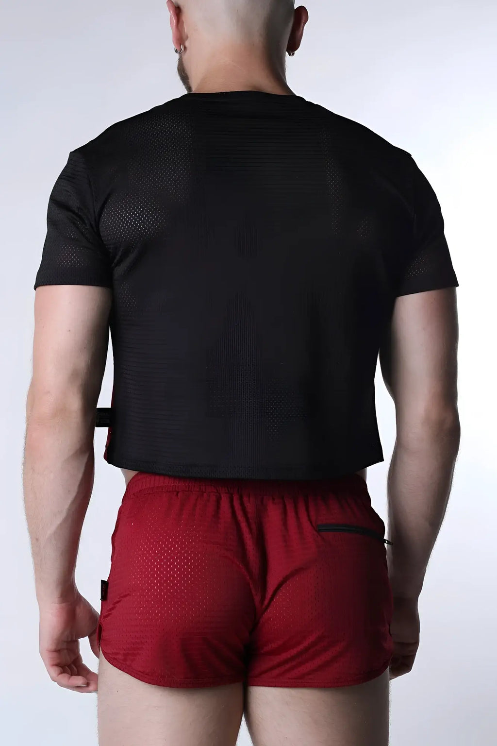 Black mesh short-sleeved crop top with subtle textured pattern starter mesh crop top for casual wear