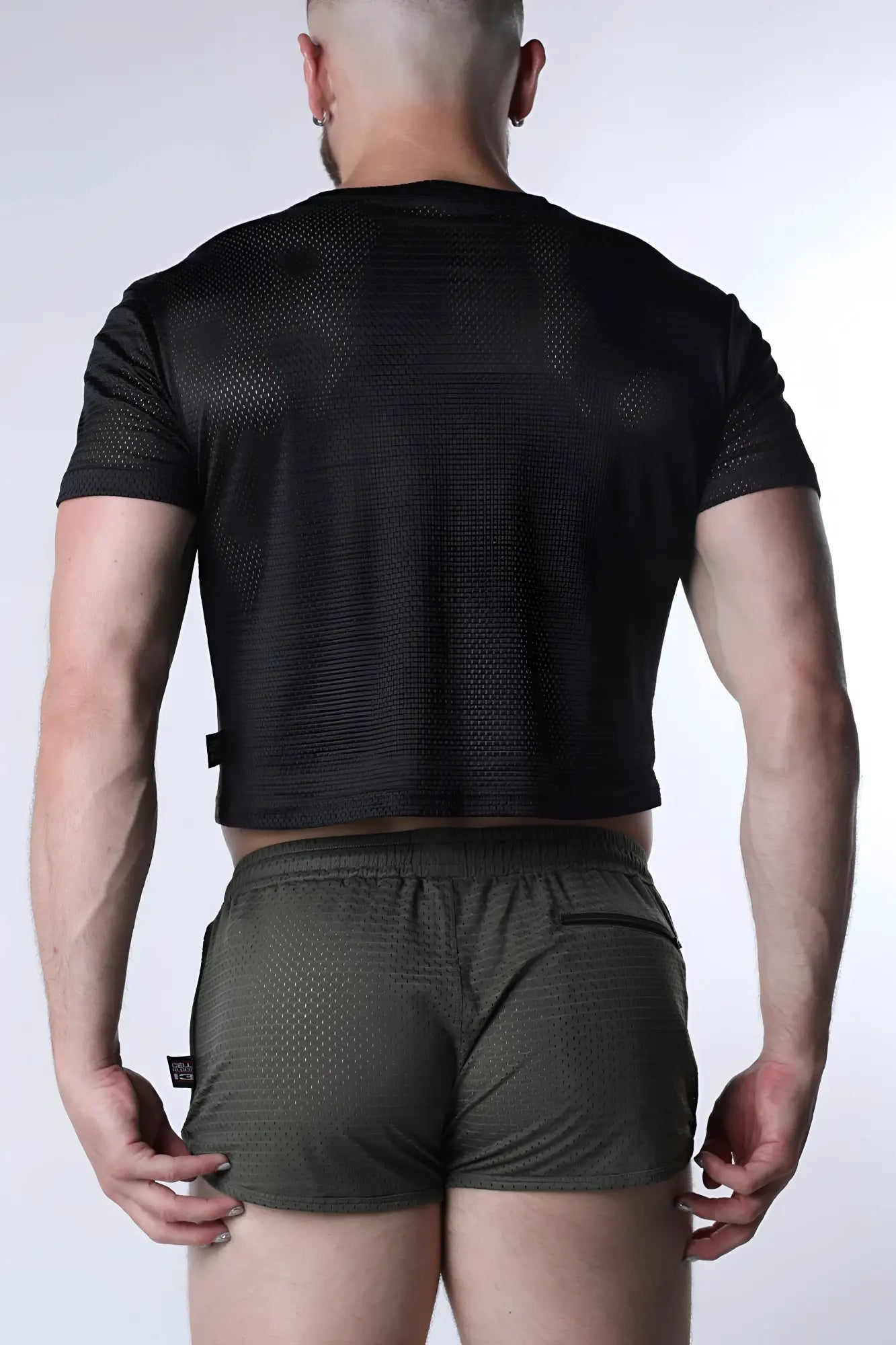 Starter mesh crop top black short-sleeved breathable mesh fabric with textured perforations on the back side