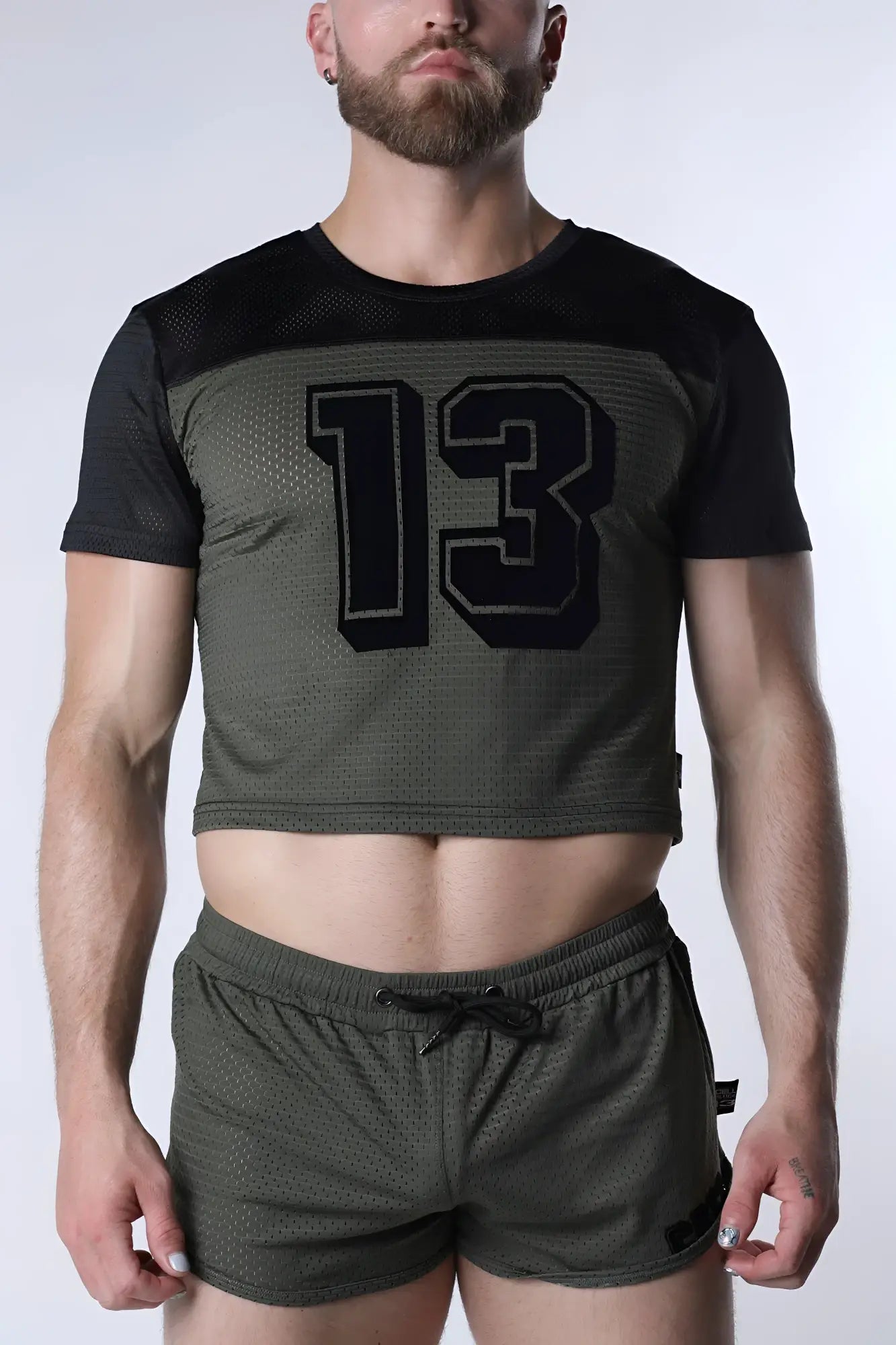 Starter mesh crop top in olive green mesh with black short sleeves and bold 13 graphic across the chest
