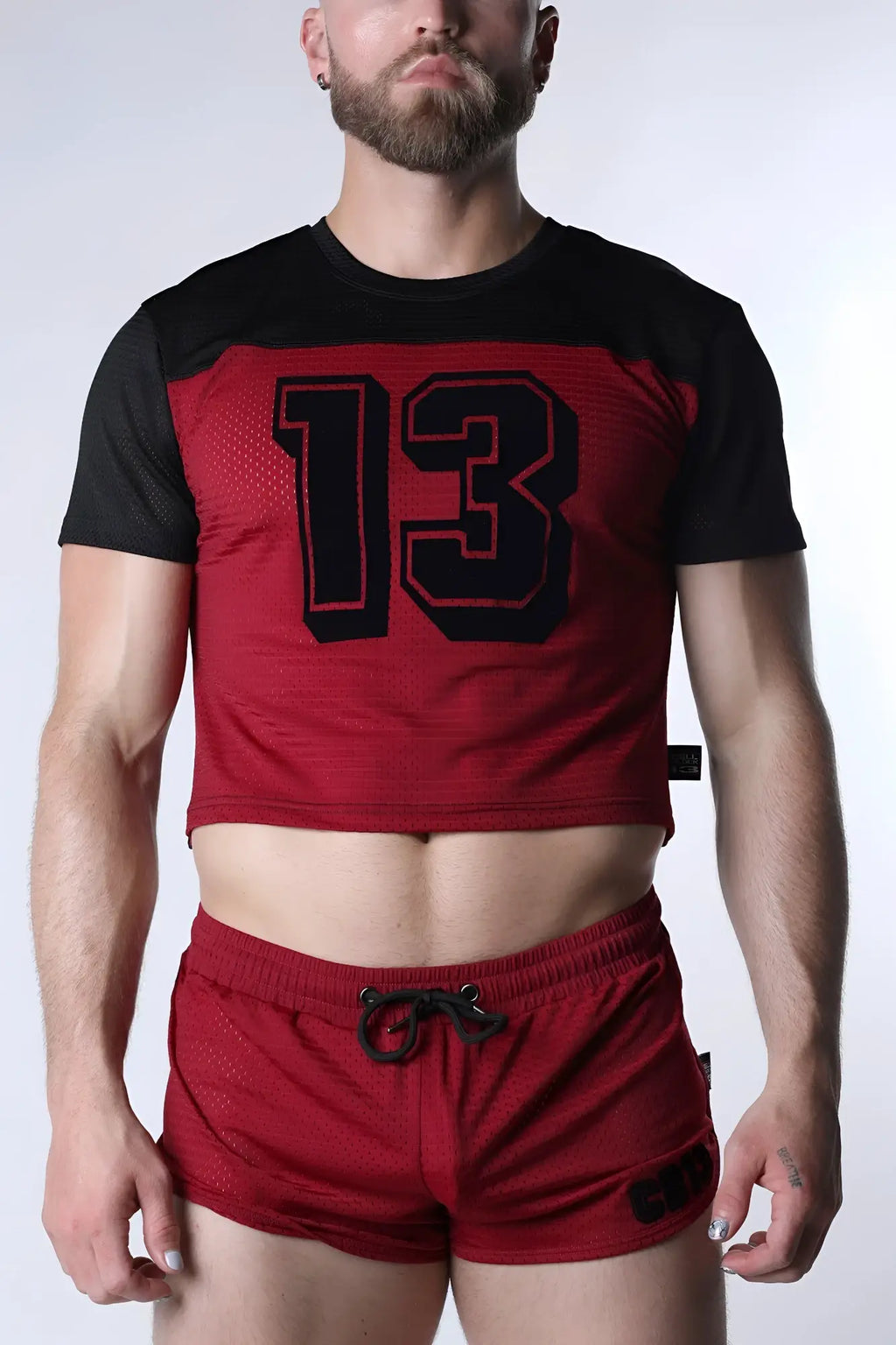 Red and black Starter mesh crop top with bold 13 graphic in breathable mesh fabric for athletic use