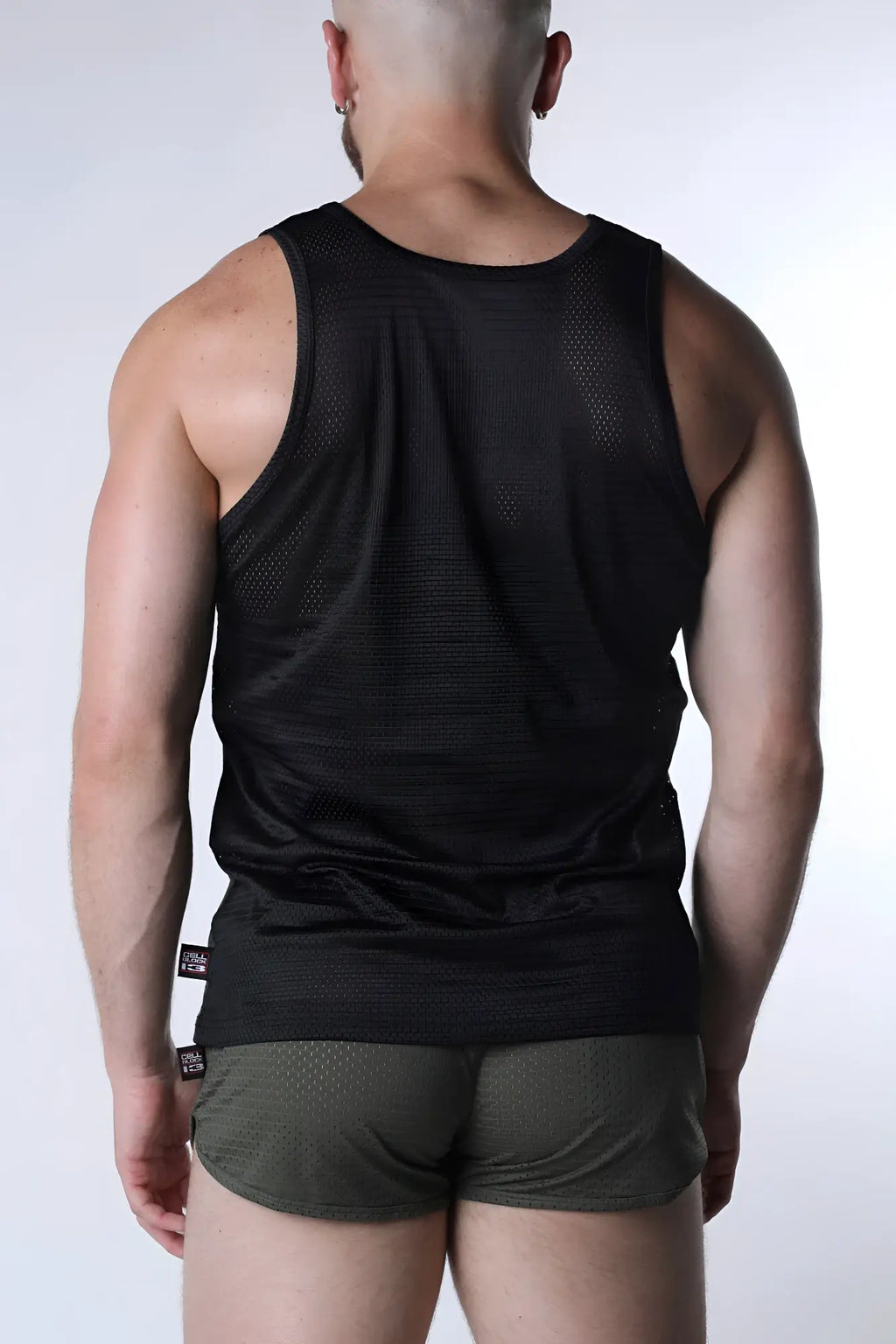 Black mesh starter tank top with fitted athletic cut designed for breathable performance and comfort