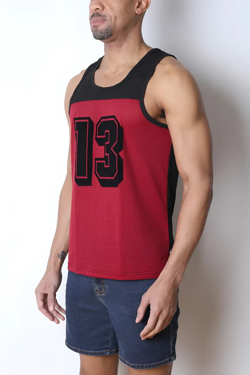 Red and black Starter mesh tank top with textured knit fabric and bold 13 numerals across the chest