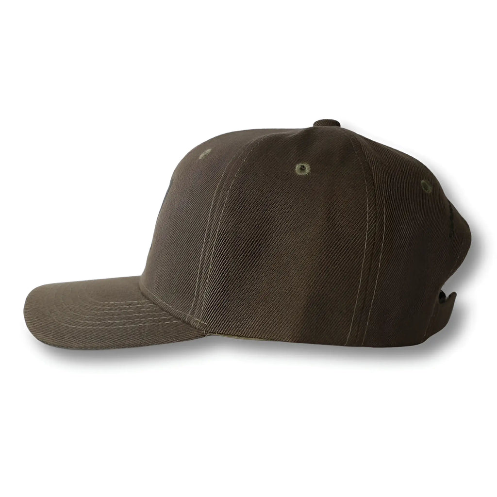 Brown canvas baseball cap with stealth ca-rio-ca logo embroidered, visible stitching, and adjustable strap on the back side