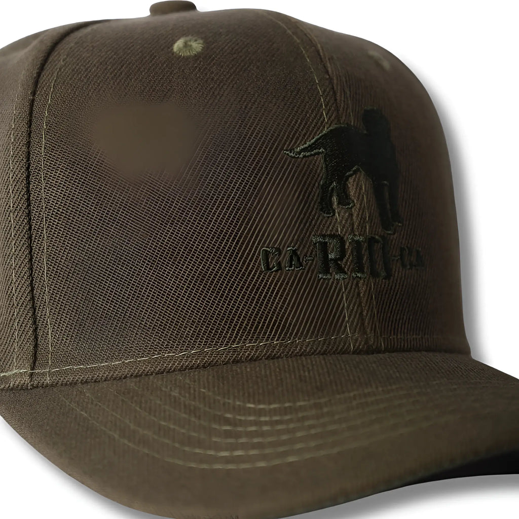 Olive green baseball cap with black embroidered dog silhouette and ca-rio logo on front panel