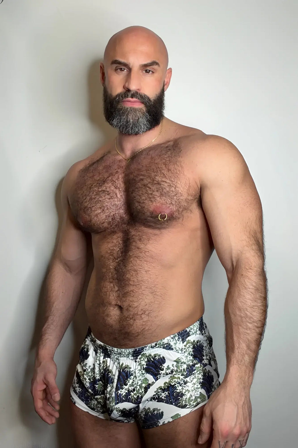 Men’s Stretch-It 2 inch athletic short briefs with white base and dark green black wave pattern for active wear
