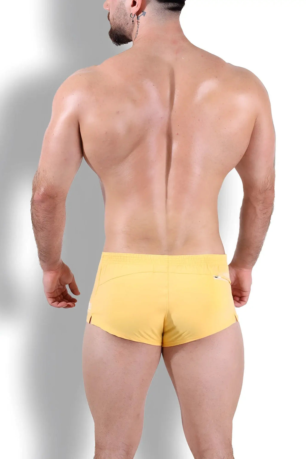 Bright yellow stretch-it 2 inch short shorts with a sleek, form-fitting design ideal for athletic use