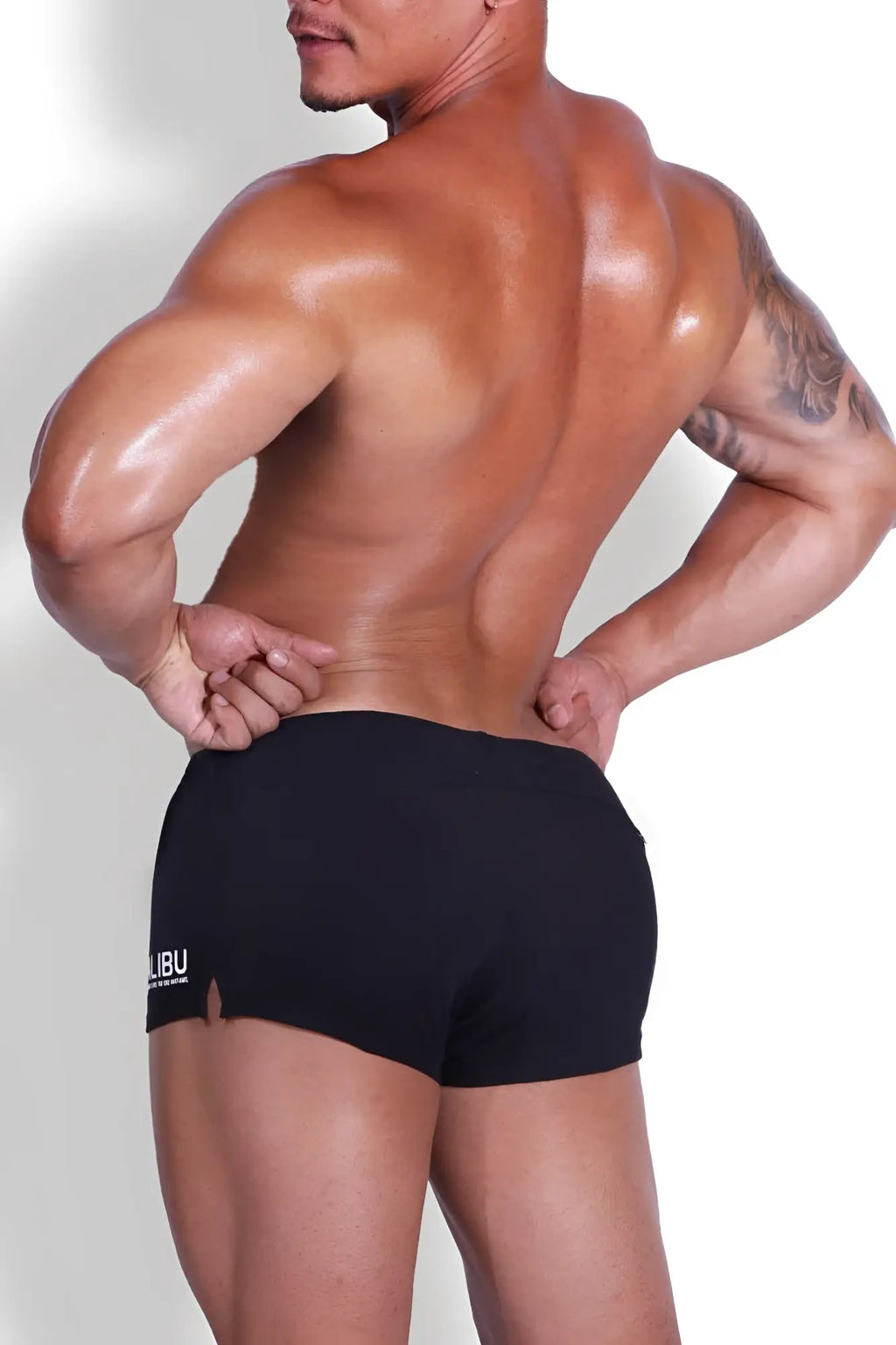 Black athletic stretch-it 2 inch short shorts with a small white logo on the left leg for active wear
