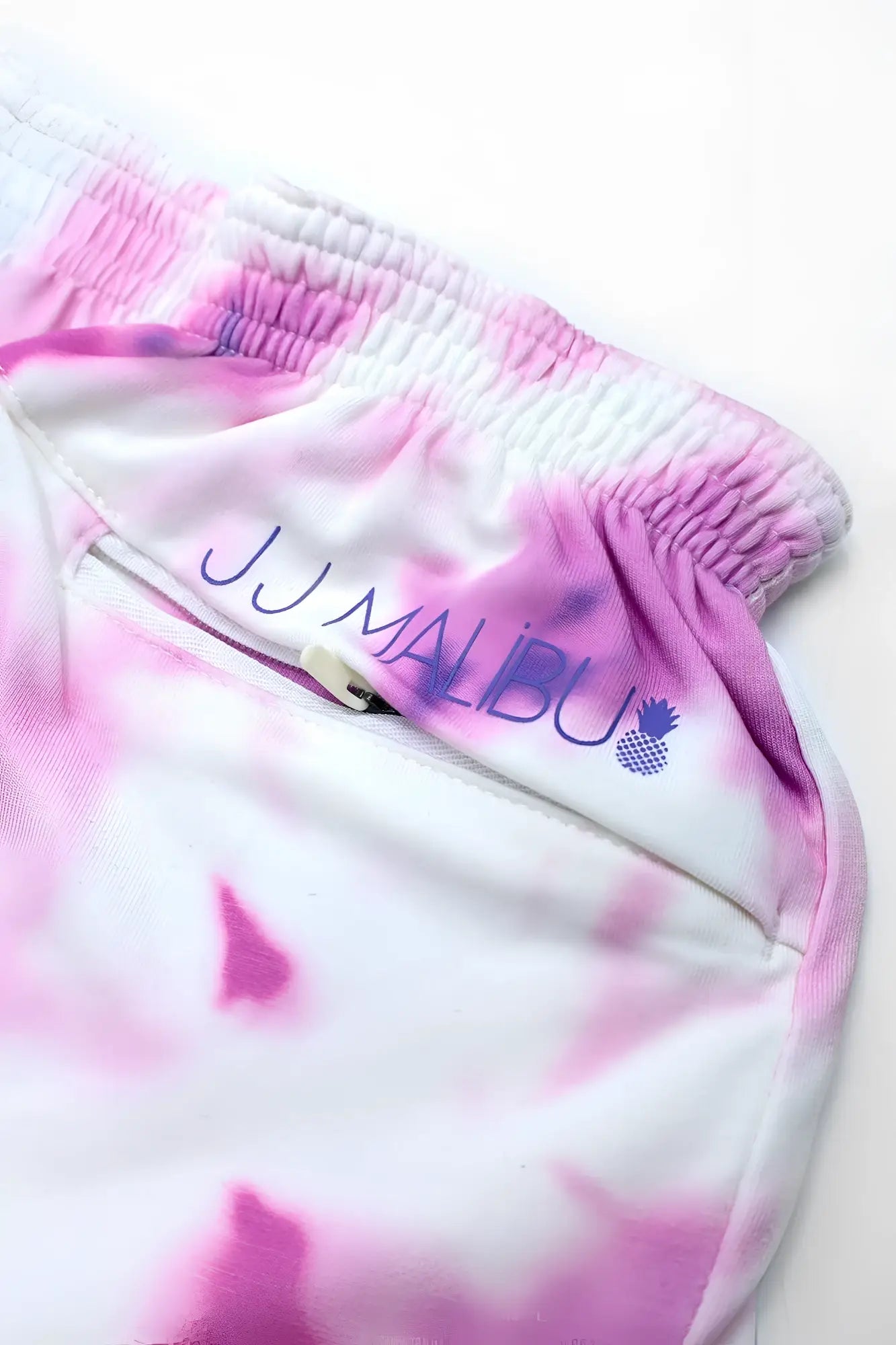 Pink and white tie-dye sweatpants with jj malibu logo embroidered on waistband stretch-it 2 inch short shorts