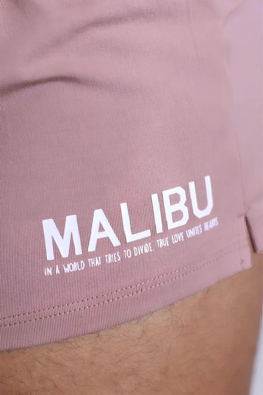 Stretch-it 2 inch raspberry glace malibu shorts in dusty rose with white embroidered lettering and slogan
