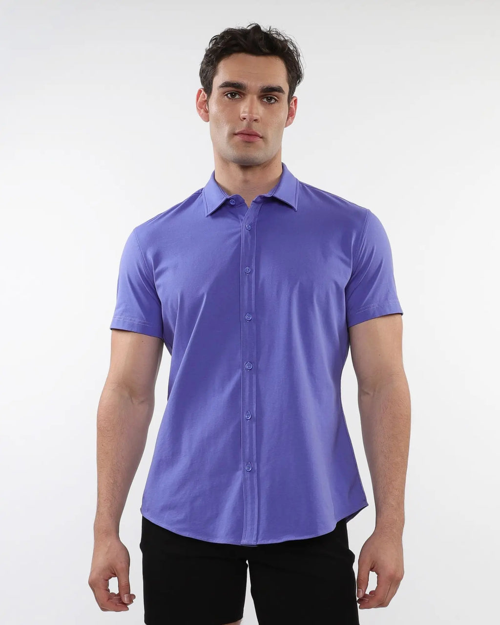 A sleek solid purple stretch knit short-sleeved shirt with a classic collar and tailored fit for casual wear