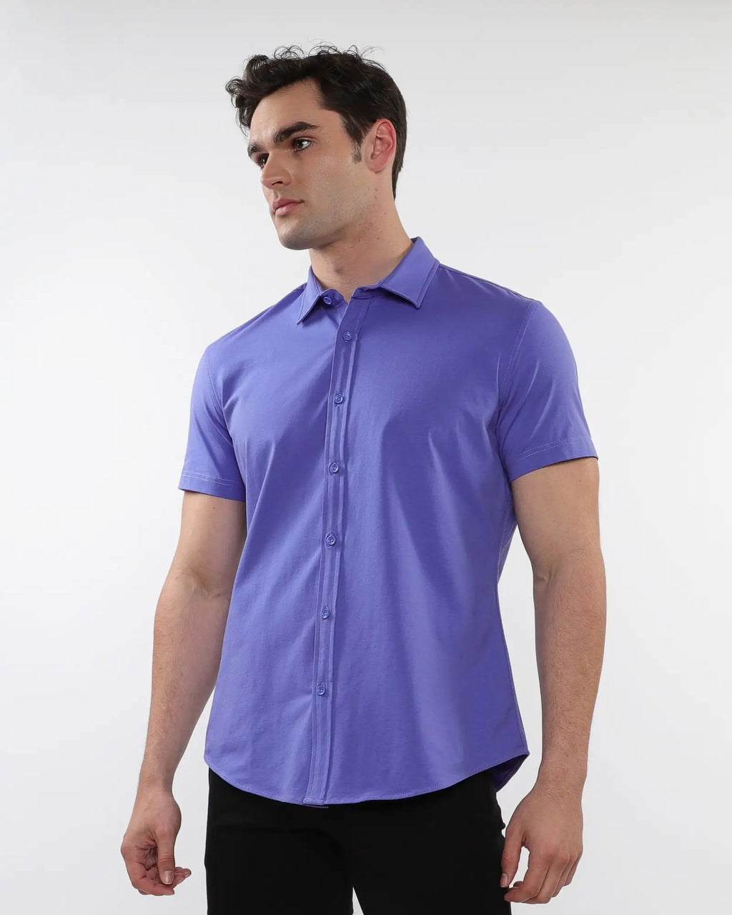 A sleek solid purple stretch knit short-sleeved dress shirt with classic collar and button-down front