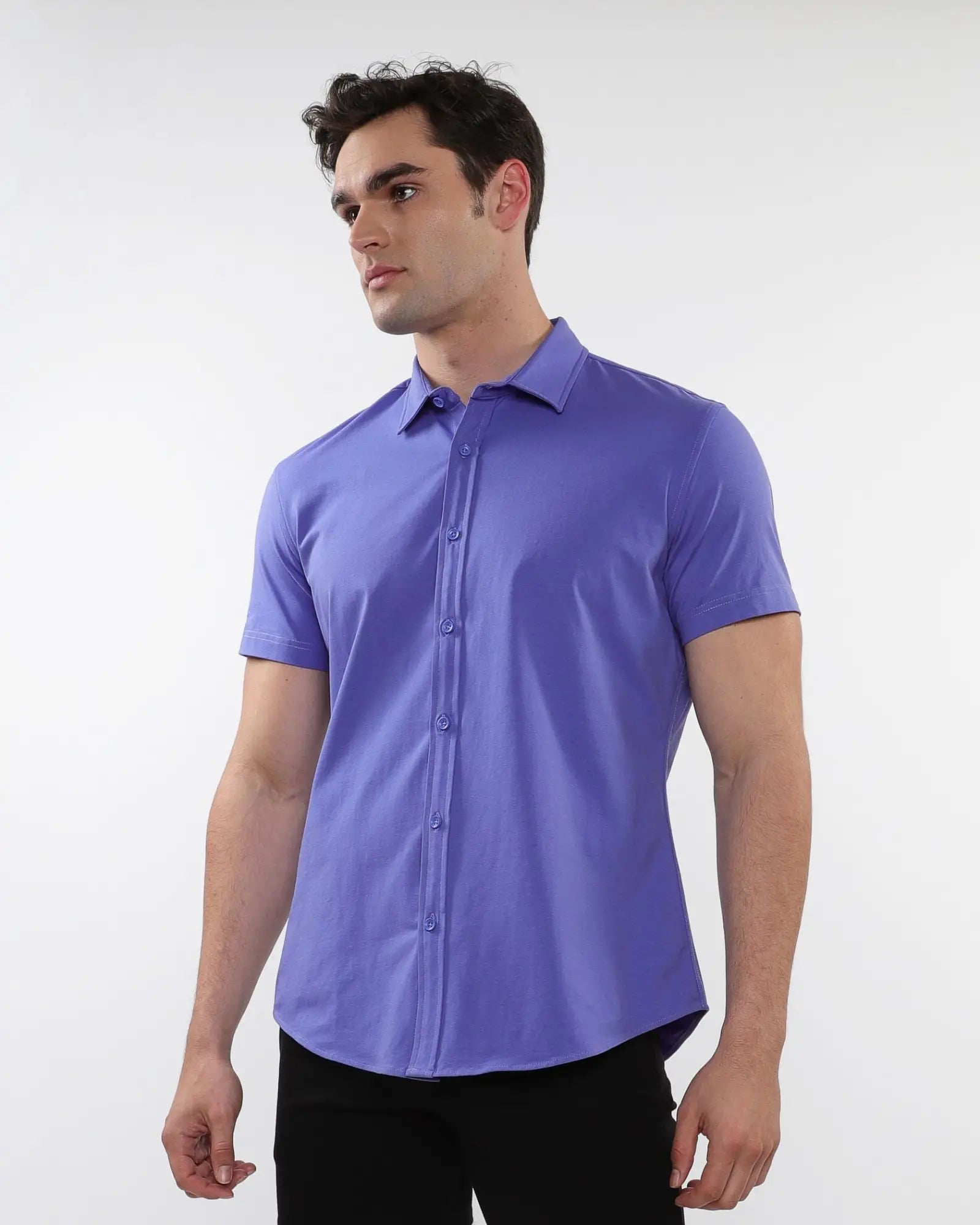 A sleek solid purple stretch knit short-sleeved dress shirt with classic collar and button-down front