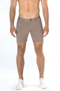 Beige stretch knit chino shorts with classic five-pocket design and button closure for comfortable casual wear