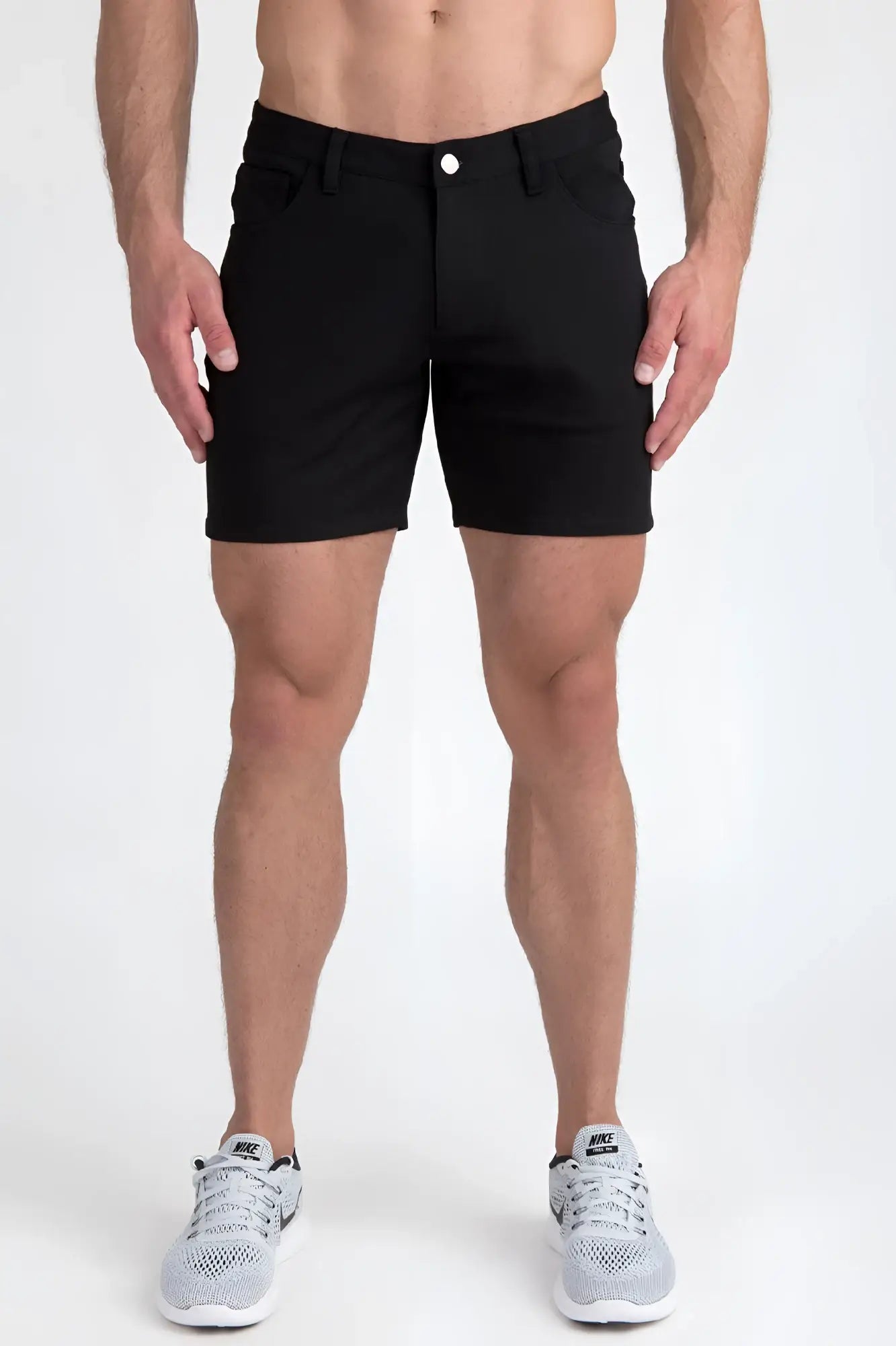 Black stretch knit shorts with a classic five-pocket design and single white button closure for casual wear