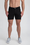 Black men’s stretch knit shorts with classic five-pocket design and single white button closure