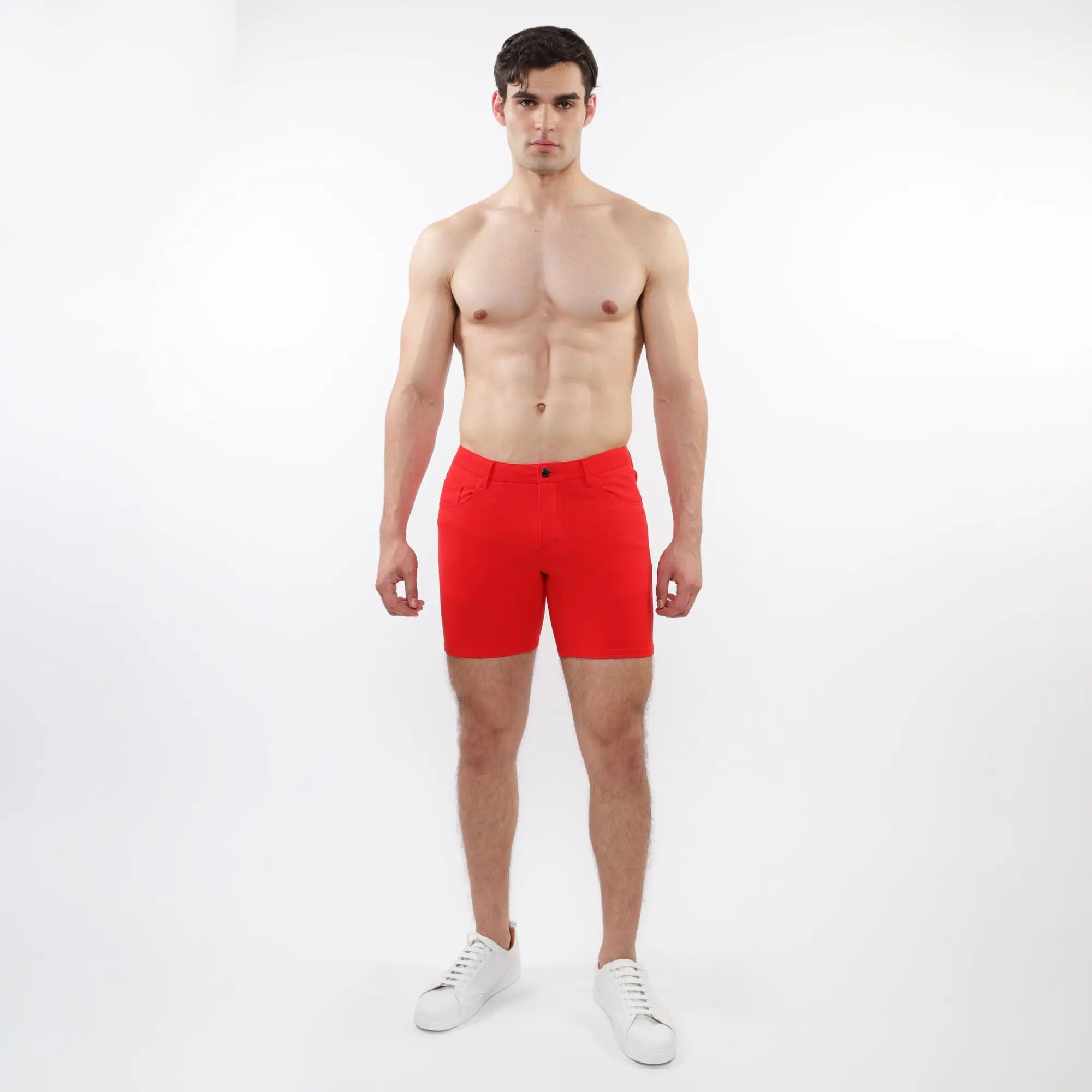 Bright red stretch knit shorts with a form-fitting design five pockets and button closure